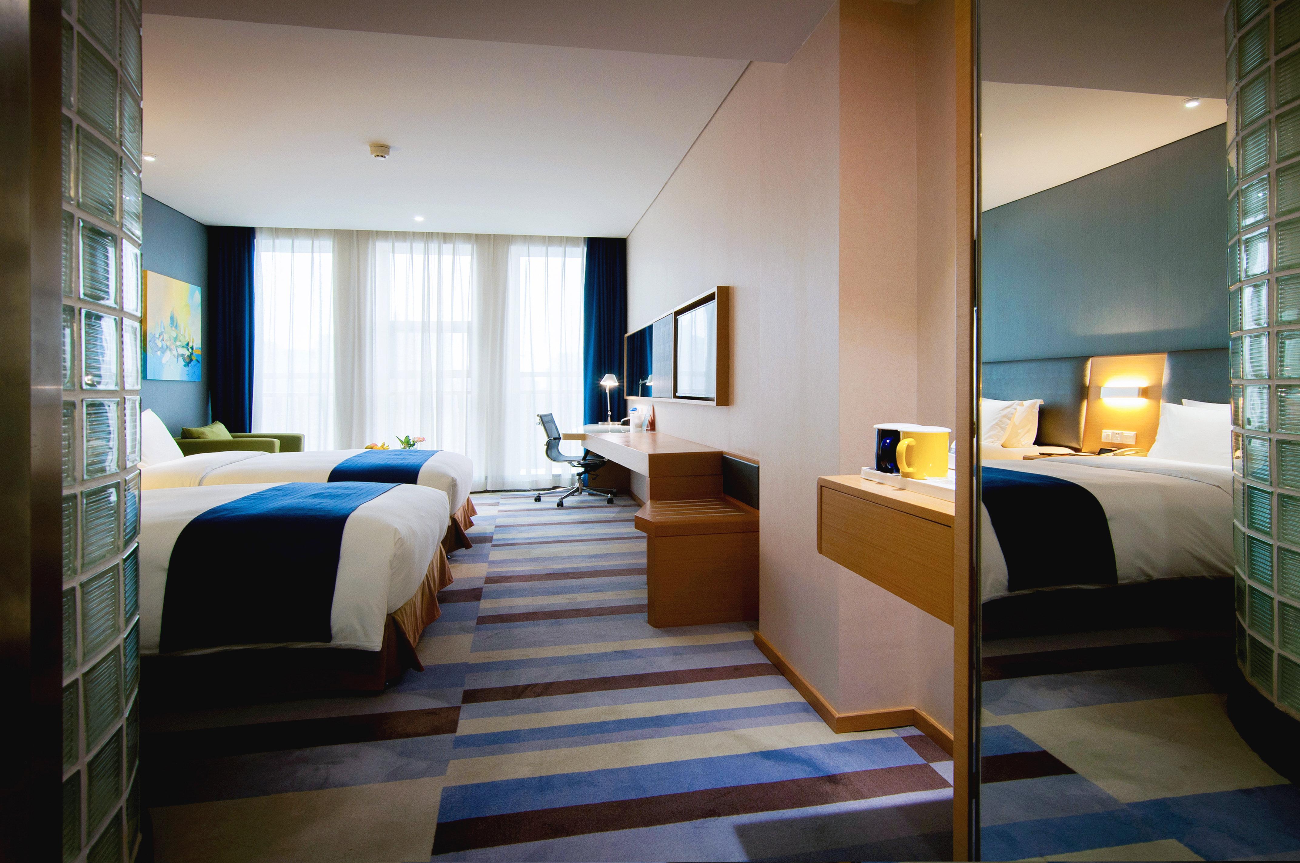 Holiday Inn Express Leshan City Square By Ihg High Speed Rail And Leshan Giant Buddha Exterior foto